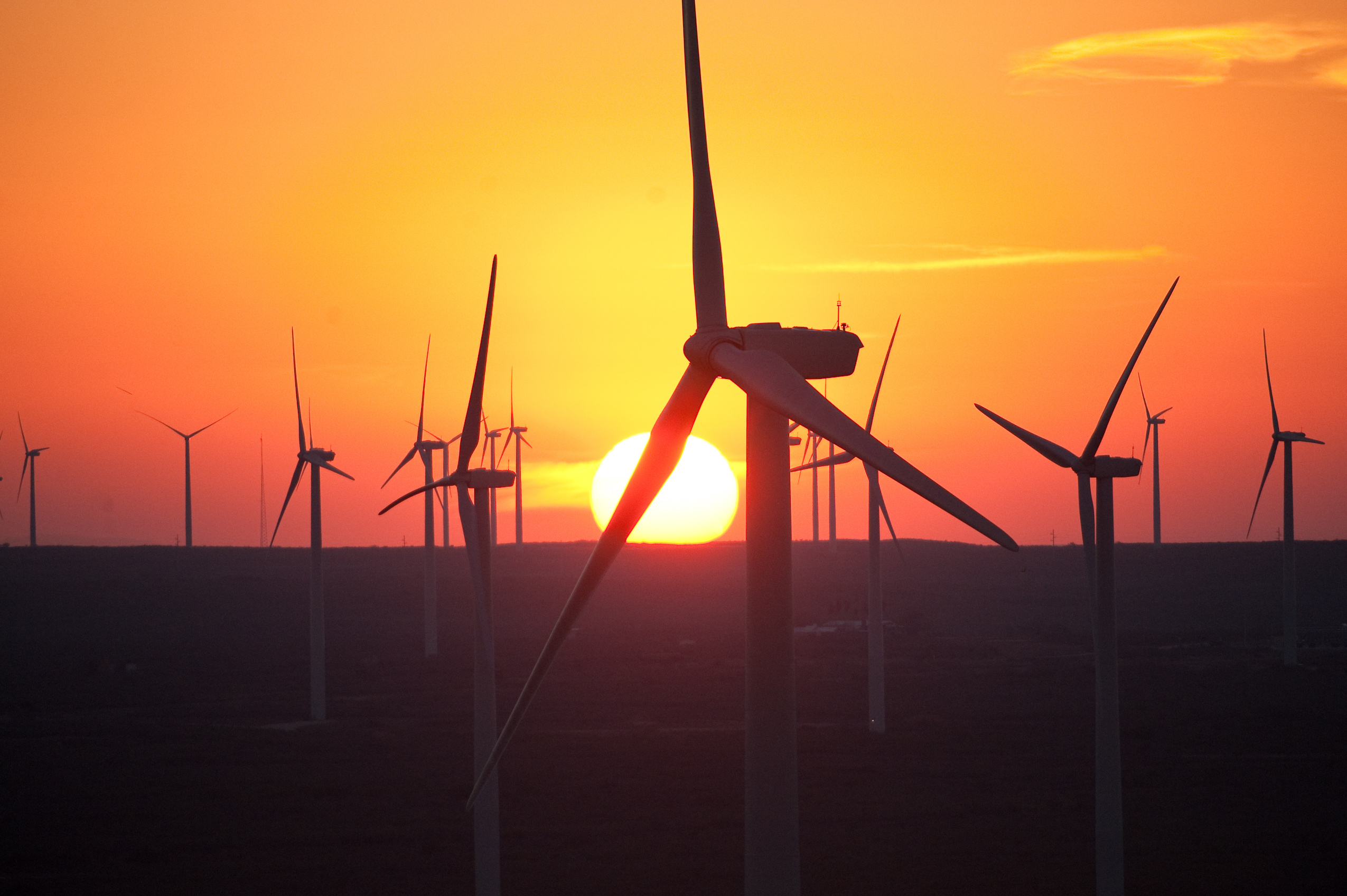 Turbines with orange skies